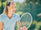 woman playing tennis in sunshine