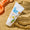 Organic Children Lavender Sun Cream SPF50 tube in the sand