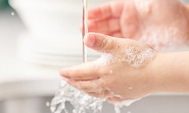 child using kids hand wash