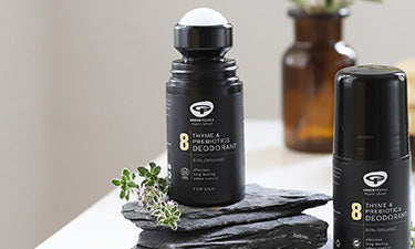 natural deodorant for men on a piece of rock