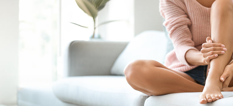 woman applying paraben free fake tan to legs